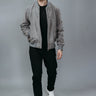 Men's Bomber Jacket made with Suede Goat Leather in Dark Gray Colour. Inner Lining is Silk Satin Material in Black Colour. It has Zipper and Matte Silver Trim.