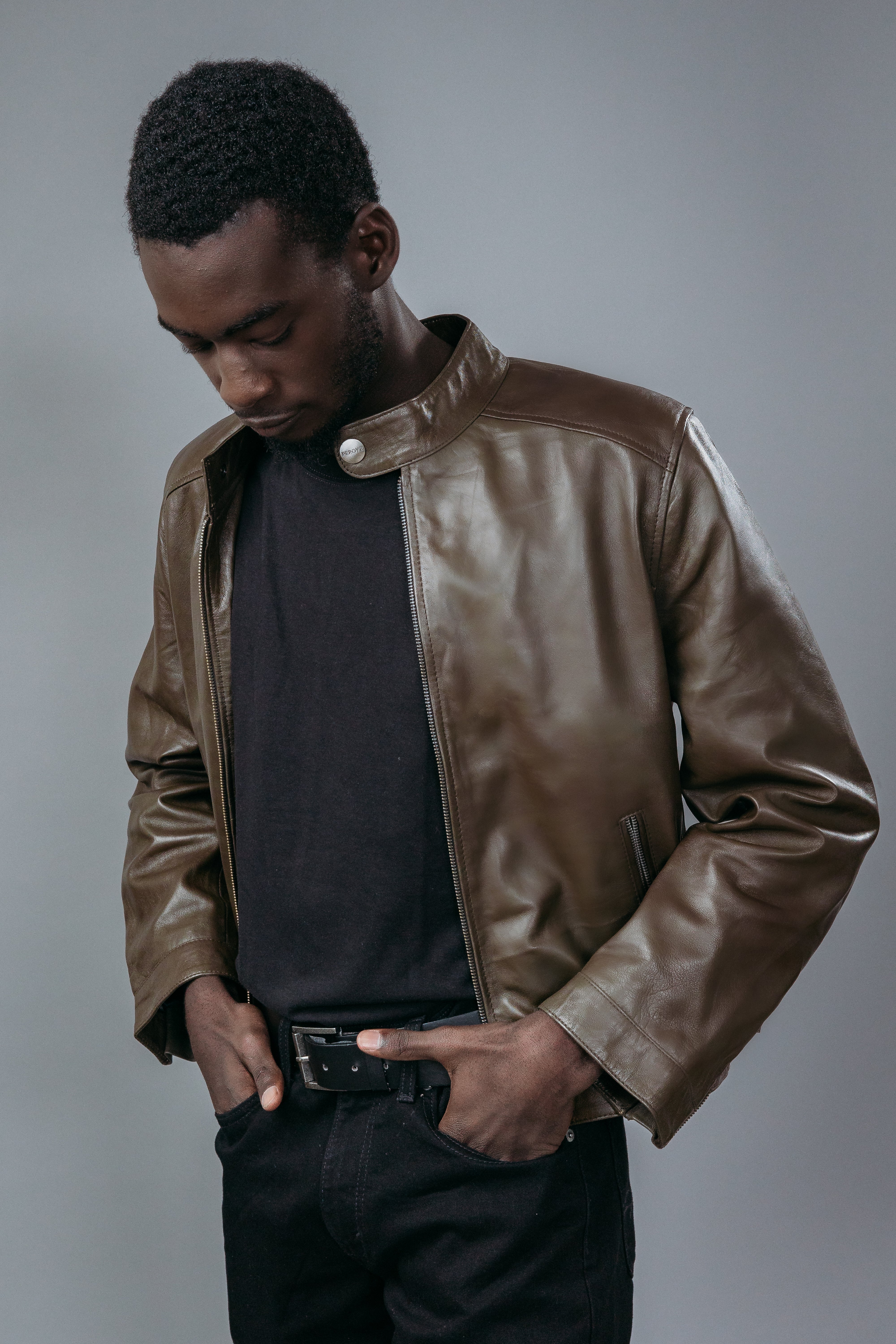 Men's Café Racer Jacket made with Semi-Aniline Sheep Leather in Nightingale Brown Colour. Inner Lining is Silk Satin Material in Black Colour. It has Zipper and Gun Metal Trim.