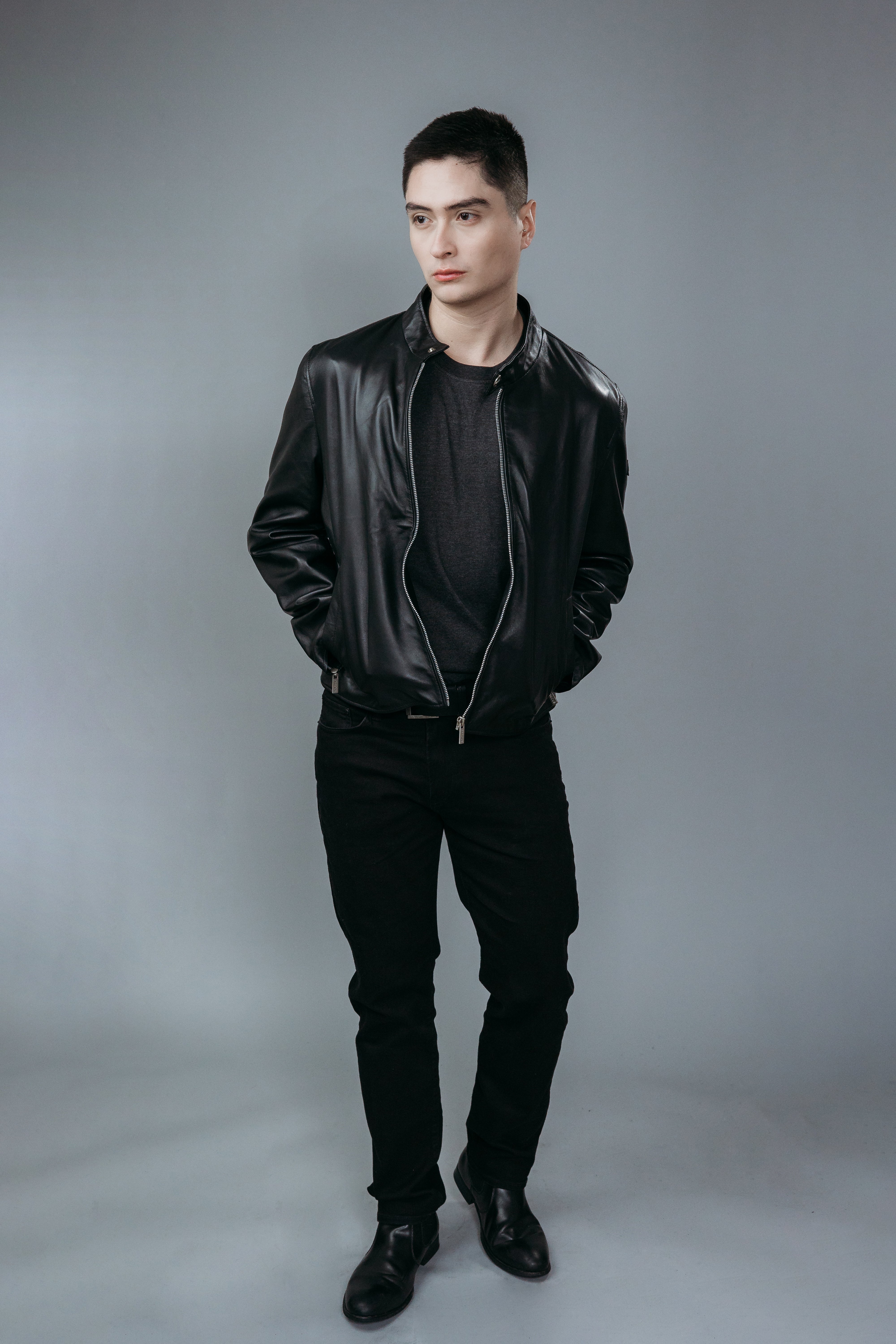 Men's Café Racer Style Inspired Jacket made with Semi-Aniline Sheep Leather in Black Colour. Inner Lining is Silk Satin Material in Black Colour. It has Zipper and Matte Silver Trim.