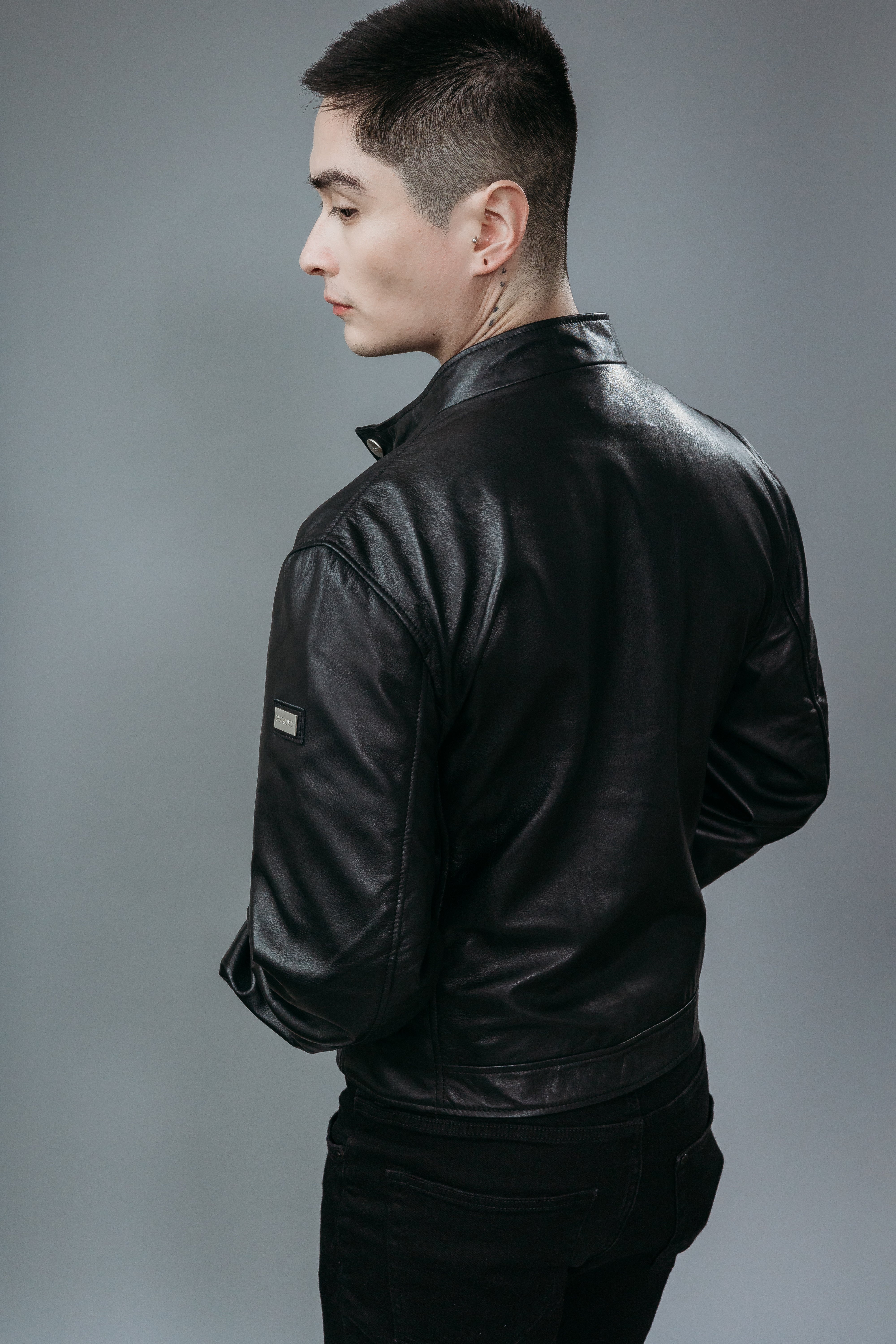 Men's Café Racer Style Inspired Jacket made with Semi-Aniline Sheep Leather in Black Colour. Inner Lining is Silk Satin Material in Black Colour. It has Zipper and Matte Silver Trim.