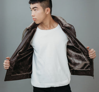 Men's Faux Fur Jacket made with Semi Aniline Sheep Leather in Dark Brown Colour. Inner Lining is Faux Fur Material in Dark Brown Colour. It has Zipper and Gun Metal Trim.