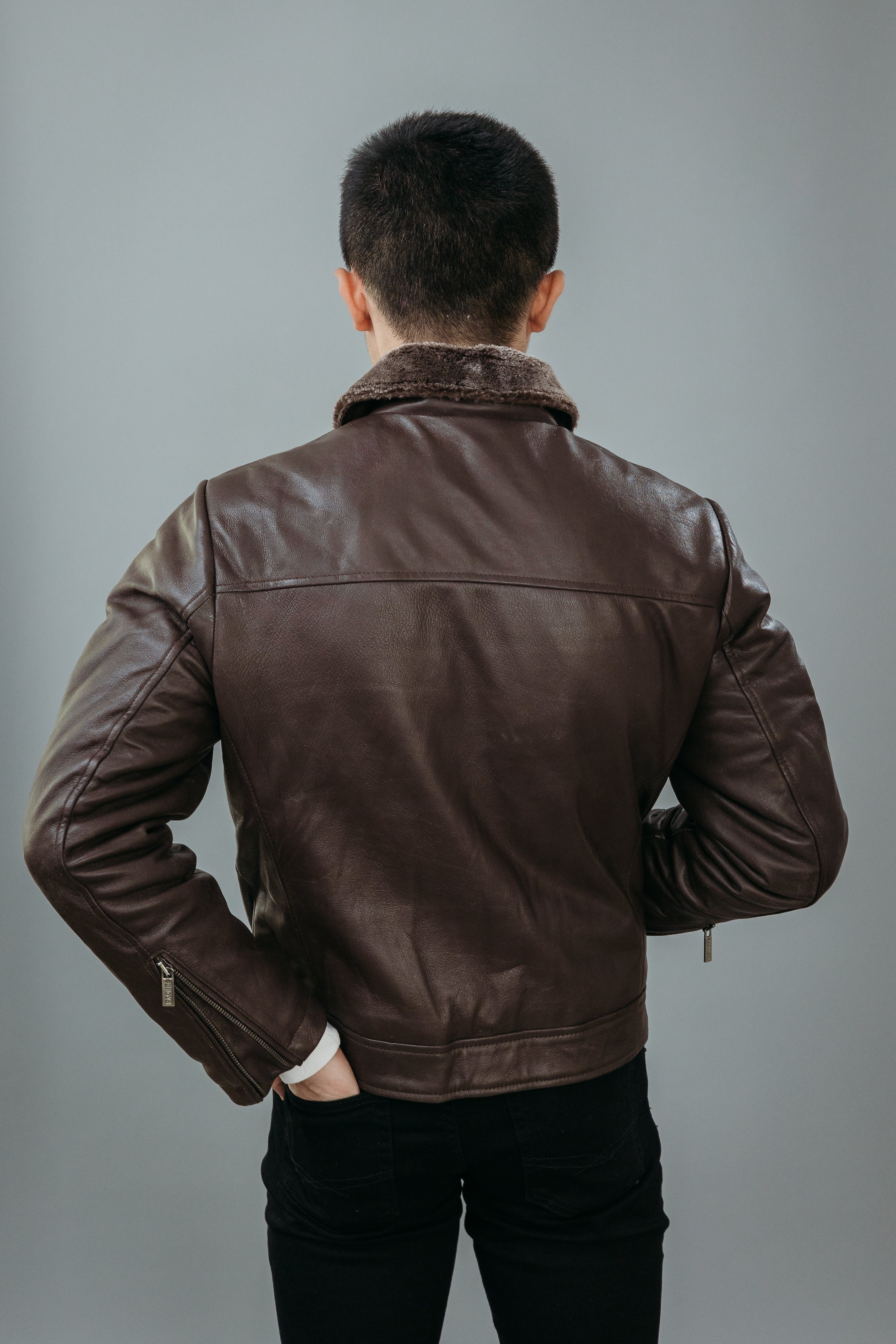 Men's Faux Fur Jacket made with Semi Aniline Sheep Leather in Dark Brown Colour. Inner Lining is Faux Fur Material in Dark Brown Colour. It has Zipper and Gun Metal Trim.