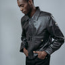 Men's Shirt Collar Style Jacket made with Semi Aniline Sheep Leather in Black Colour. Inner Lining is Silk Satin Material in Black Colour. It has Zipper and Gun Metal Trim.