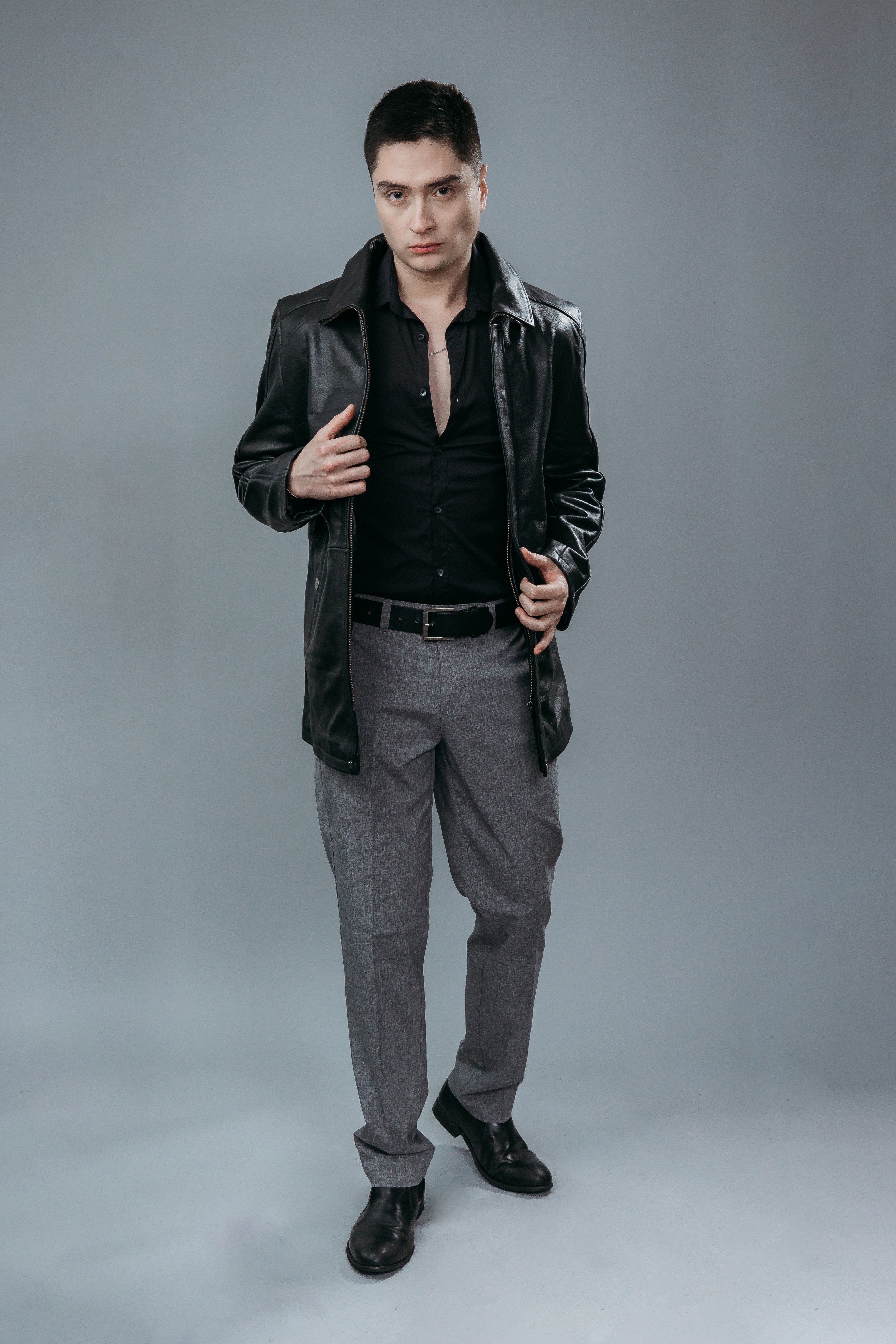 Men's Three Quarter Coat made with Natural Cow Leather in Black Colour. Inner Lining is Silk Satin Material in Black Colour. It has Zipper and Gun Metal Trim.