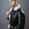 Men's Three Quarter Style Faux Fur Jacket made with Semi Aniline Sheep Leather in Black Colour. Inner Lining is Faux Fur Material in White Colour. It has Zipper and Gun Metal Trim.