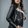 Women's Biker Jacket made with Semi-Aniline Sheep Leather in Black and Off White Colour. Inner Lining is Silk Satin Material in Black Colour. It has Zipper and Matte Silver Trim.