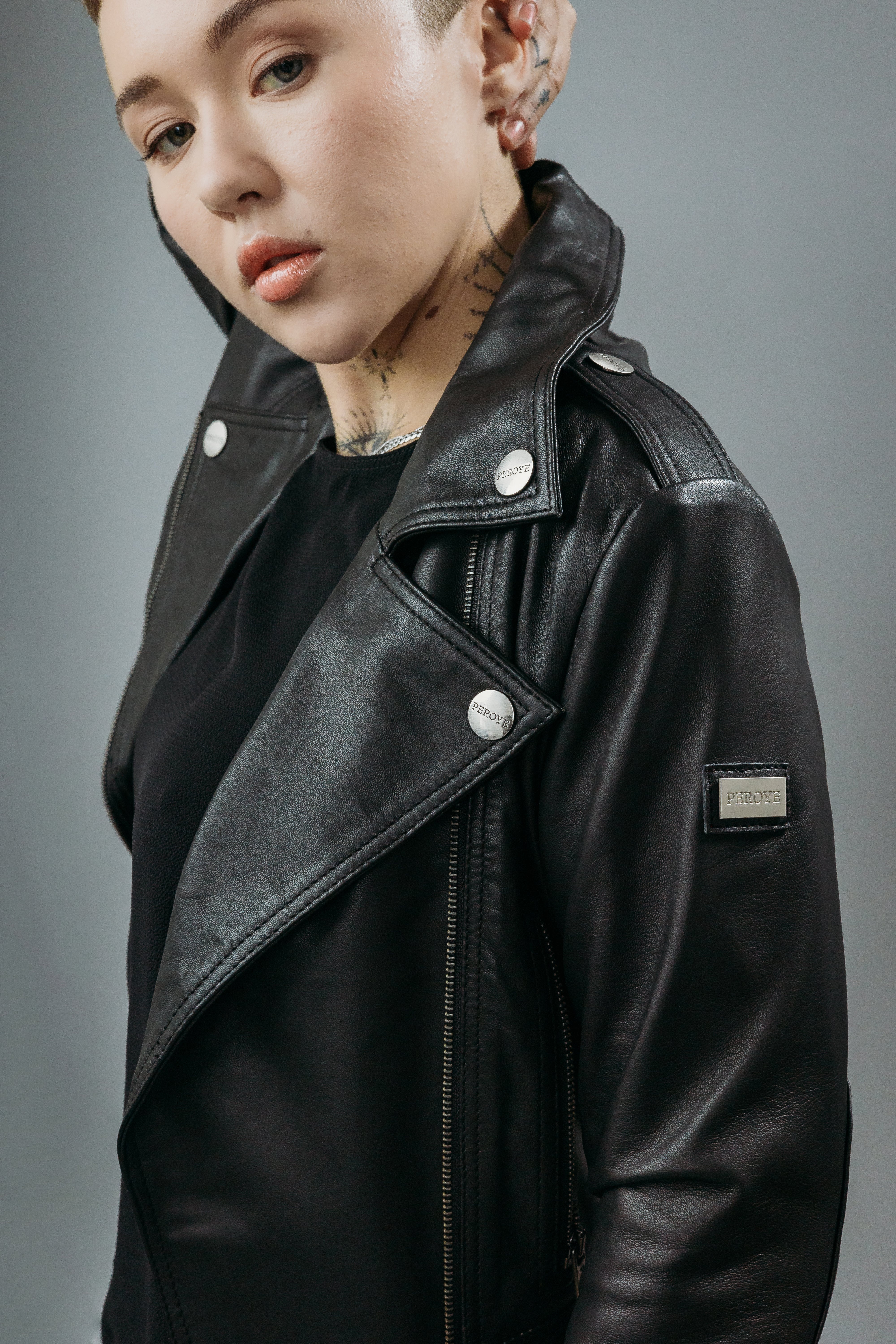 Women's Biker Jacket made with Semi-Aniline Sheep Leather in Black Colour. Inner Lining is Silk Satin Material in Black Colour. It has Zipper and Gun Metal Trim.