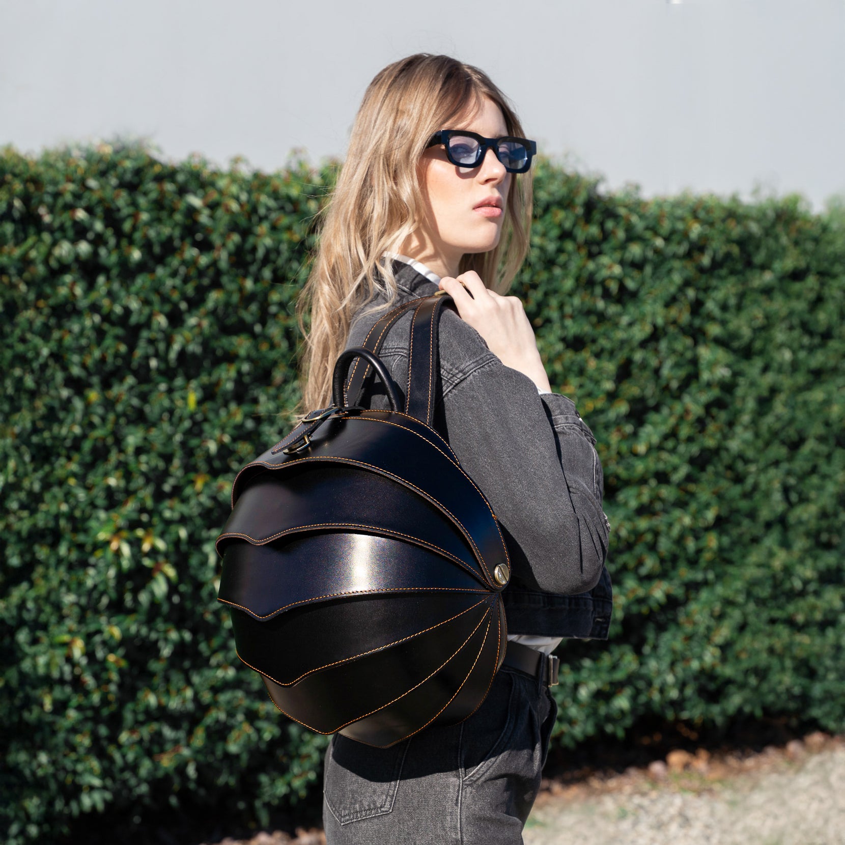 black leather backpack featured by peroye women model
