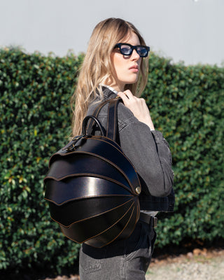 black leather backpack featured by peroye women model