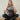 brown leather backpack featuring women model